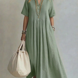 Green pleated midi dress