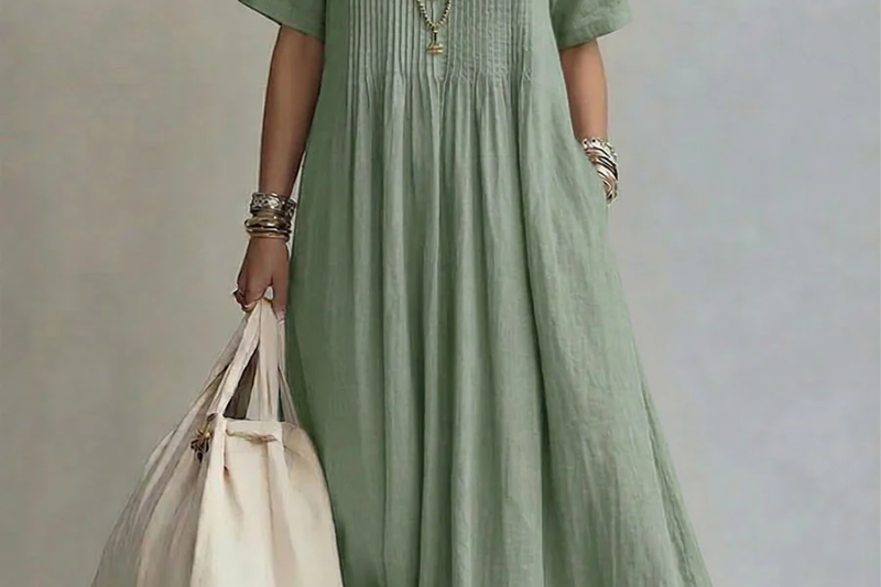 Green pleated midi dress