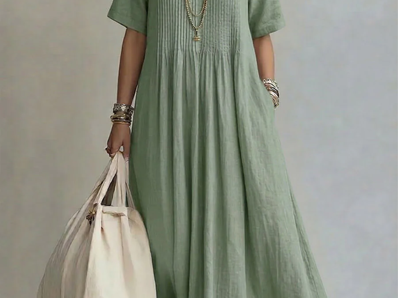 Green pleated midi dress