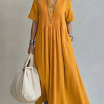 Yellow pleated midi dress