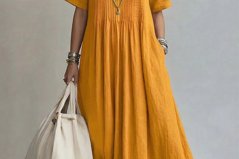 Yellow pleated midi dress