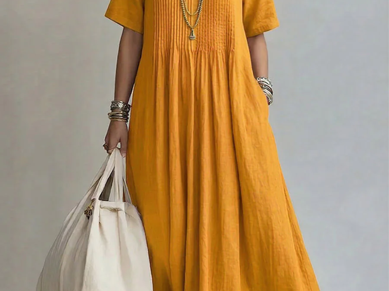 Yellow pleated midi dress